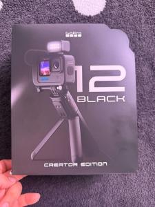 GoPro HERO12 Black Action Creator Edition Accessories and Original Documents.