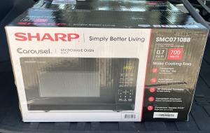 Sharp 0.7-cu Ft 700-Watt Countertop Microwave (Black)