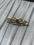 Art Nouveau Rolled Gold Brooch with Purple Rhinestones