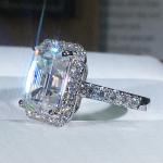 Emerald Cut Moissanite Halo Engagement Ring in Gold