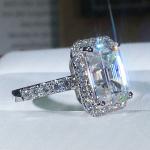 Emerald Cut Moissanite Halo Engagement Ring in Gold