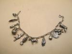 Silver Charm Bracelet with 11 Unique Antique Charms