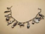Silver Charm Bracelet with 11 Unique Antique Charms