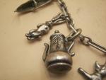 Silver Charm Bracelet with 11 Unique Antique Charms