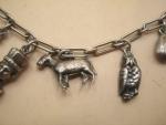Silver Charm Bracelet with 11 Unique Antique Charms