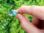 Art Deco Platinum Twist Ring with Emerald and Diamonds