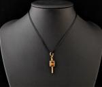 9ct Gold Cased Foiled Paste Watch Key Pendant