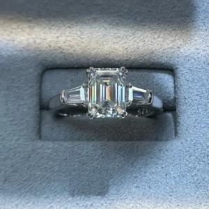 Emerald Moissanite Three-Stone Engagement Ring in White Gold
