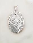 Vintage Oval Silver Photo Locket with Floral Design