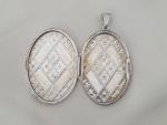 Vintage Oval Silver Photo Locket with Floral Design