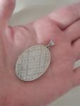 Vintage Oval Silver Photo Locket with Floral Design