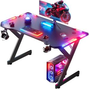 DLONGONE Gaming Desk with LED Lights, Whole Board RGB Gaming Table, Gamer Desk with Cup Holder and Headphone Hook, Computer Desk 100 x 60 cm, Black