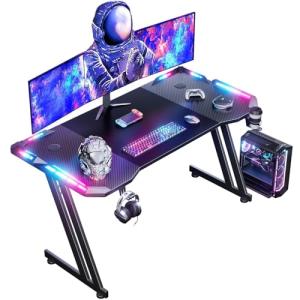 DLONGONE Gaming Desk with LED Lights, 120 x 60 cm Gaming Table Z Shaped, Gamer Desk with Carbon Fiber Coated, Gaming PC Table with Headphone Hook and Cup Holder, Computer Desks Easy to Assemble, Black