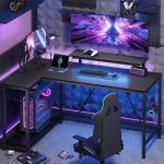 Bestier 132.5CM L-Shaped Workstation with Carbon Fibre Surface, 3 Power Outlets & 2 USB Ports, LED Strip Lights – Reversible Corner Unit with Shelves & Hooks for Home Office & Gaming