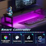 DEVAISE L Shaped Gaming Desk with Power Outlets & RGB LED Lights, 111CM Gaming Desk with Monitor Stand & Hook, Corner Desks with Storage Shelf for Home Office & Small Spaces, Black