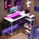 DEVAISE L Shaped Gaming Desk with Power Outlets & RGB LED Lights, 122CM Gaming Desk with Monitor Stand & Hook, Corner Desks with Storage Shelf for Home Office & Small Spaces, White
