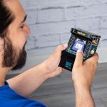 Basic Fun Arcade Classics Mini WWE – Retro Handheld Game with Joystick, Full-Colour Screen & Authentic Sound Effects – Batteries Included, Black