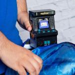 Basic Fun Arcade Classics Mini WWE – Retro Handheld Game with Joystick, Full-Colour Screen & Authentic Sound Effects – Batteries Included, Black