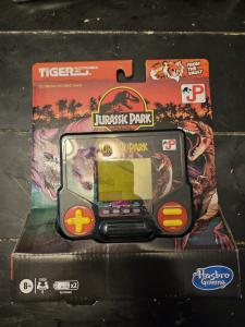 Tiger Electronics Jurassic Park Electronic LCD Video Game, Retro-Inspired 1-Player Handheld Game, Ages 8 and Up