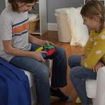 Hasbro Gaming Simon Electronic Memory Game, Handheld Light and Sound Game, Ages 8 and Up