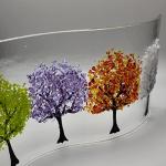 Handmade fused glass tree showing four seasons wave shaped panel
