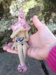 Fairy garden fairy, ceramic plant pot ornament, outdoor indoor figurine, pink hat, holding a blue butterfly.