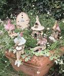 Shy fairy garden figurine, ceramic pixie plant pot ornament
