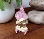 Fairy garden shy fairy, ceramic plant pot ornament, hand made and hand painted, reading a book of fairytales, pink hat and boots. Cross legged. ORIGINAL DESIGN MADE IN ENGLAND BY SALLY MOSS