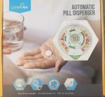 Automatic Pill Dispenser with Remote Monitoring System