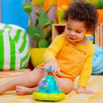 Bright Starts Press & Glow Spinner Baby Toy