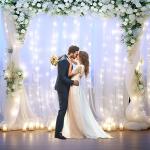 White Tulle Curtain with String Lights for Events