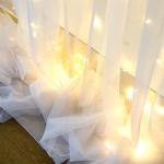 White Tulle Curtain with String Lights for Events