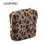 Portable and Stylish Corduroy Sanitary Napkin Organizer Bag with Ample Room for Personal Hygiene Items (Cow)