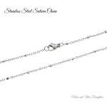 MOM & THREE DAUGHTERS Basset Hound Women's Necklace Silver Pewter Charm | Handcrafted 22 Inch Stainless Steel Saturn Chain | Adorable Silver Toned Mixed Metal Paw Print Bale | Great Choice for Anyone