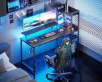 ODK Reversible Gaming Desk with Power Outlets and LED Lights, 48 Inch Computer Desk with Storage Shelves and Monitor Stand, Modern Writing Study Desk for Home Office, Carbon Fiber Black