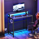 YATINEY Small Computer Desk with Charging Station and LED Lights, Gaming Desk with Monitor Stand, 2-Tier Home Office Desk with 4 Side Hooks, for Living Room, Home Office, Black DN01UDBBY2