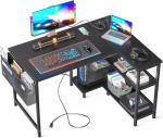 ODK 40 Inch Small L Shaped Gaming Computer Desk with Power Outlets, Reversible Storage Shelves & PC Stand for Home Office, Simple Writing Study Table with Storage Bag for Small Space, Black