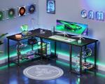 Casaottima 51 Inch L Shaped Gaming Desk with Shelves & Power Outlets, Reversible Computer Desk with Storage Shelves for Home Office, Black