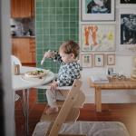 mushie Long Sleeve Baby Bib | Water Resistant Adjustable Fit for Ages 6-24 Months (Olive Check)