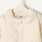 Amazon Essentials x Sofia Grainge Baby Girls' Midweight Quilted Field Jacket with Ruffle, Ivory, 12 Months