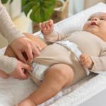 Ingenuity Contoured Changing Pad – Includes Waterproof Changing Liner and Safety Fastening Strap with Quick-Release Buckle