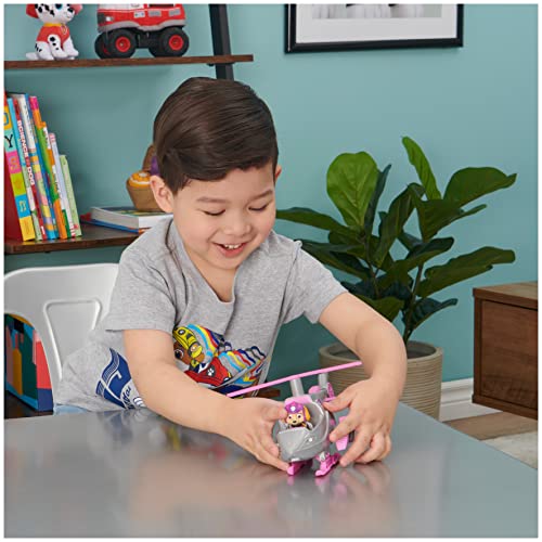 Paw Patrol, Skyeâs Deluxe Movie Transforming Toy Car with Collectible Action Figure, Kids Toys for Ages 3 and up by Spin Master
