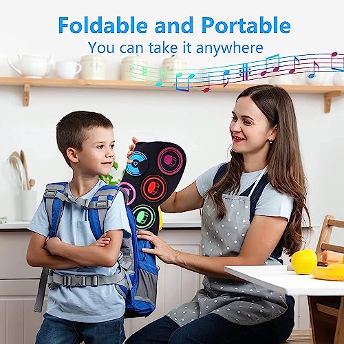 Electronic Drum Set, EKEMOND 9 Drum Practice Pad with Headphone Jack, Roll-up Drum Pad Machine Built-in Speaker Drum Pedals Drum Sticks 10 Hours Playtime, Ideal Christmas Holiday Gift for Kids by JiuJiang YuanXun DianZiShangWu YouXianGongSi