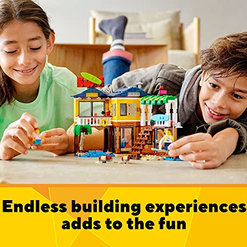 LEGO Creator 3-in-1 Surfer Beach House 31118 - Featuring Lighthouse, Pool House, Boat, 2 Minifigures, Dolphin Figure, Great Summer Building Toy Set for Kids, Girls, and Boys Ages 8+ by LEGO