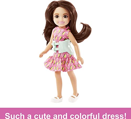 Barbie Toys, Chelsea Doll, 6-Inch Small Doll with Brace for Scoliosis Spine Curvature, Brunette Wearing Pink Lightning Bolt Dress by Mattel