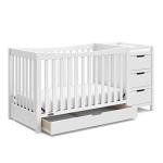 Graco Remi Convertible Crib with Drawer and Changer (White) - JPMA Certified, Attached Changing Table with 3 Drawers, 2 Shelves, and Water-Resistant Changing Pad by Storkcraft