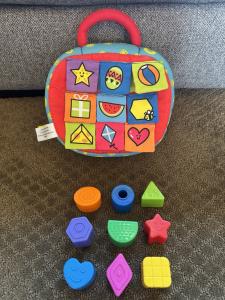 Melissa & Doug K's Kids Take-Along Shape Sorter Baby Toy With 2-Sided Activity Bag and 9 Textured Shape Blocks by Melissa & Doug