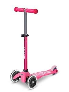 Micro Kickboard - Mini Deluxe LED - Three Wheeled, Lean-to-Steer Swiss-Designed Micro Scooter for Toddlers & Children with Motion-Activated Light-Up Wheels for Ages 2-5 (Pink) from Micro Kickboard