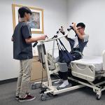 Tuffcare Stand Up Electric Patient Lift - Sit to Stand, Standing Lift, Rhino Lift with Manual Low Base - with Standing Sling (Medium) and Buttock Strap, 380 lb. Weight Capacity by Tuffcare