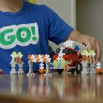 PLUS PLUS - GO! Educational Tub Wheel Mix - 2,600 Pieces / 15 Chassis / 24 Wheels / 36 Big Wheels - Construction Building Stem / Steam Toy, Kids Mini Puzzle Blocks from Plus-Plus